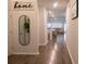 Open concept entryway leading to living room and kitchen at 217 Pink Azalea St, Summerville, SC 29485