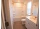Full bathroom with tub, shower, and white vanity at 217 Pink Azalea St, Summerville, SC 29485