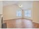 Bright living room with hardwood floors, vaulted ceilings, and multiple windows at 195 Fox Squirrel Run, Summerville, SC 29483