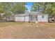 Spacious backyard with a screened porch at 195 Fox Squirrel Run, Summerville, SC 29483
