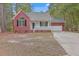 Brick house with a small porch and driveway at 195 Fox Squirrel Run, Summerville, SC 29483