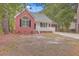 Brick house with a small porch and driveway at 195 Fox Squirrel Run, Summerville, SC 29483