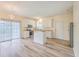 Kitchen boasts white cabinets, stainless steel appliances, and an island at 195 Fox Squirrel Run, Summerville, SC 29483