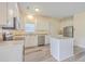 Kitchen with white cabinets, stainless steel appliances and island at 195 Fox Squirrel Run, Summerville, SC 29483