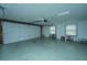 Spacious garage with light-grey floor and ample storage at 225 Cantering Hills Ln, Summerville, SC 29483