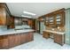 Kitchen with wood cabinets, built-in desk, and stainless steel appliances at 225 Cantering Hills Ln, Summerville, SC 29483