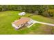 Aerial view of a house with a detached garage and large yard at 225 Cantering Hills Ln, Summerville, SC 29483