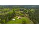 House and property situated on a wooded lot at 225 Cantering Hills Ln, Summerville, SC 29483