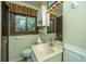 Clean bathroom with a sink, toilet and window, ready for your updates! at 225 Cantering Hills Ln, Summerville, SC 29483