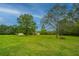 House and detached garage on a spacious lot with trees at 225 Cantering Hills Ln, Summerville, SC 29483
