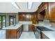 Kitchen with wood cabinets, a large island, and stainless steel appliances at 225 Cantering Hills Ln, Summerville, SC 29483