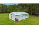 White metal detached shop with double garage doors at 225 Cantering Hills Ln, Summerville, SC 29483