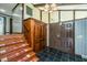 Entryway with staircase, built-in storage, and double doors at 225 Cantering Hills Ln, Summerville, SC 29483