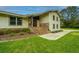 Two-story house with brick staircase and landscaped yard at 225 Cantering Hills Ln, Summerville, SC 29483