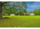 Property features a house, detached garage, and picnic table at 225 Cantering Hills Ln, Summerville, SC 29483