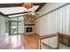 Living room with stone fireplace, wood floors, and vaulted ceiling at 225 Cantering Hills Ln, Summerville, SC 29483