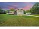 Beautiful home exterior with a large lawn and detached garage at 225 Cantering Hills Ln, Summerville, SC 29483
