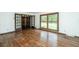 Bright living room with hardwood floors and access to an entryway at 225 Cantering Hills Ln, Summerville, SC 29483