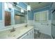 Updated bathroom with dual sinks, a shower, and a toilet at 225 Cantering Hills Ln, Summerville, SC 29483