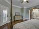 Main bedroom with hardwood floors, dresser and private access to the deck at 120 Old Peafield Rd, Saint George, SC 29477