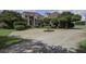 Brick house with landscaping and a long driveway at 120 Old Peafield Rd, Saint George, SC 29477