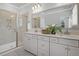 Double vanity bathroom with a large walk-in shower and marble flooring at 127 O'Malley Dr, Summerville, SC 29483