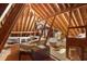 Unfinished attic space with exposed wooden beams and ample storage potential at 2340 Marsh Hen Dr, Seabrook Island, SC 29455