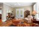 Home office with built-in desk and hardwood floors at 2340 Marsh Hen Dr, Seabrook Island, SC 29455