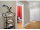 Powder room with red walls and unique sink vanity at 2340 Marsh Hen Dr, Seabrook Island, SC 29455