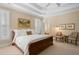 Main bedroom with a sleigh bed and ensuite bathroom access at 2340 Marsh Hen Dr, Seabrook Island, SC 29455