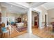 Large living room with hardwood floors, comfortable seating, and area rugs at 2340 Marsh Hen Dr, Seabrook Island, SC 29455