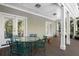 Covered porch with outdoor dining set at 2340 Marsh Hen Dr, Seabrook Island, SC 29455