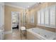 Spa-like bathroom with a walk-in shower and a soaking tub at 2340 Marsh Hen Dr, Seabrook Island, SC 29455