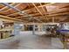 Unfinished basement with high ceilings and shelving for storage at 2340 Marsh Hen Dr, Seabrook Island, SC 29455