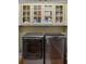 Laundry room with washer, dryer, and ample storage at 2340 Marsh Hen Dr, Seabrook Island, SC 29455