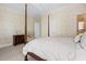 Bedroom with four-poster bed and access to bathroom at 2340 Marsh Hen Dr, Seabrook Island, SC 29455