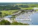 Aerial view of waterfront property with marina and numerous boats at 2340 Marsh Hen Dr, Seabrook Island, SC 29455