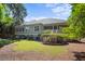 Charming house exterior with lush landscaping and spacious porch at 2340 Marsh Hen Dr, Seabrook Island, SC 29455