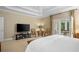 Bright bedroom with a sitting area and access to a private patio at 2340 Marsh Hen Dr, Seabrook Island, SC 29455