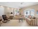 Relaxing sitting room with comfortable sofas, pillows, and a coffee table at 2340 Marsh Hen Dr, Seabrook Island, SC 29455