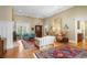 Spacious living room with hardwood floors, fireplace, and comfortable seating at 2340 Marsh Hen Dr, Seabrook Island, SC 29455