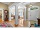 Spacious entryway with hardwood floors and views into dining room at 2340 Marsh Hen Dr, Seabrook Island, SC 29455