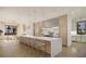 Modern kitchen with marble island and breakfast bar at 3209 Marshall Blvd, Sullivans Island, SC 29482