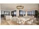 Open concept dining area with marble table and ocean views at 3209 Marshall Blvd, Sullivans Island, SC 29482