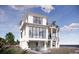 Luxury waterfront home with a pool, expansive windows, and multiple levels at 3209 Marshall Blvd, Sullivans Island, SC 29482