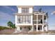 Stunning coastal home with a wrap-around porch, multiple balconies, and ocean views at 3209 Marshall Blvd, Sullivans Island, SC 29482