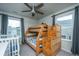 Bedroom with a built-in bunk bed and plenty of natural light at 210 Winding River Dr, Johns Island, SC 29455