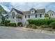 Community clubhouse with landscaping and welcoming entrance at 210 Winding River Dr, Johns Island, SC 29455
