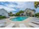 Community pool with plenty of lounge chairs at 210 Winding River Dr, Johns Island, SC 29455