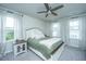 Bright bedroom with a queen bed, window, and ceiling fan at 210 Winding River Dr, Johns Island, SC 29455